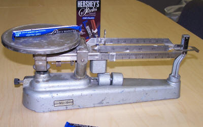 Hershey's Stick on triple-beam balance