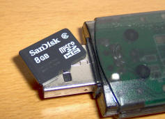 Micro memory card compared to USB connector
