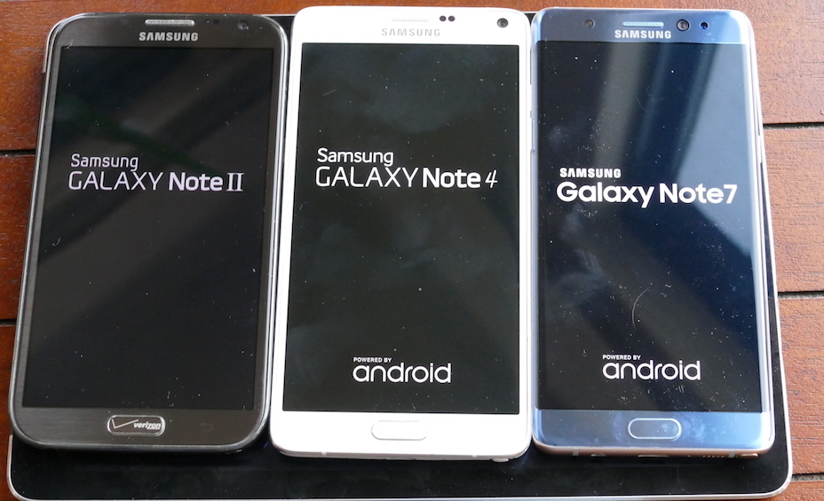 The Samsung Galaxy Note 2, 4, and 7, on a bed of iPad Air