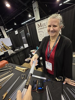 Melissa Mallard, whose company makes conductor batons - and ONLY conductor batons - let me try a few before selecting one made of carbon fiber for a special application. They're easy-waving for sure.