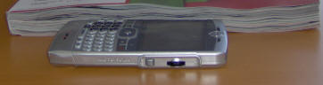 Motorola Q compared to magazine thickness.