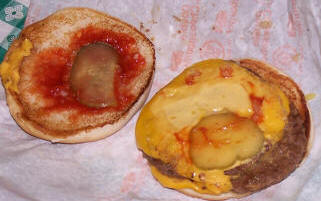 Double Cheeseburger, pickles exposed for extermination.